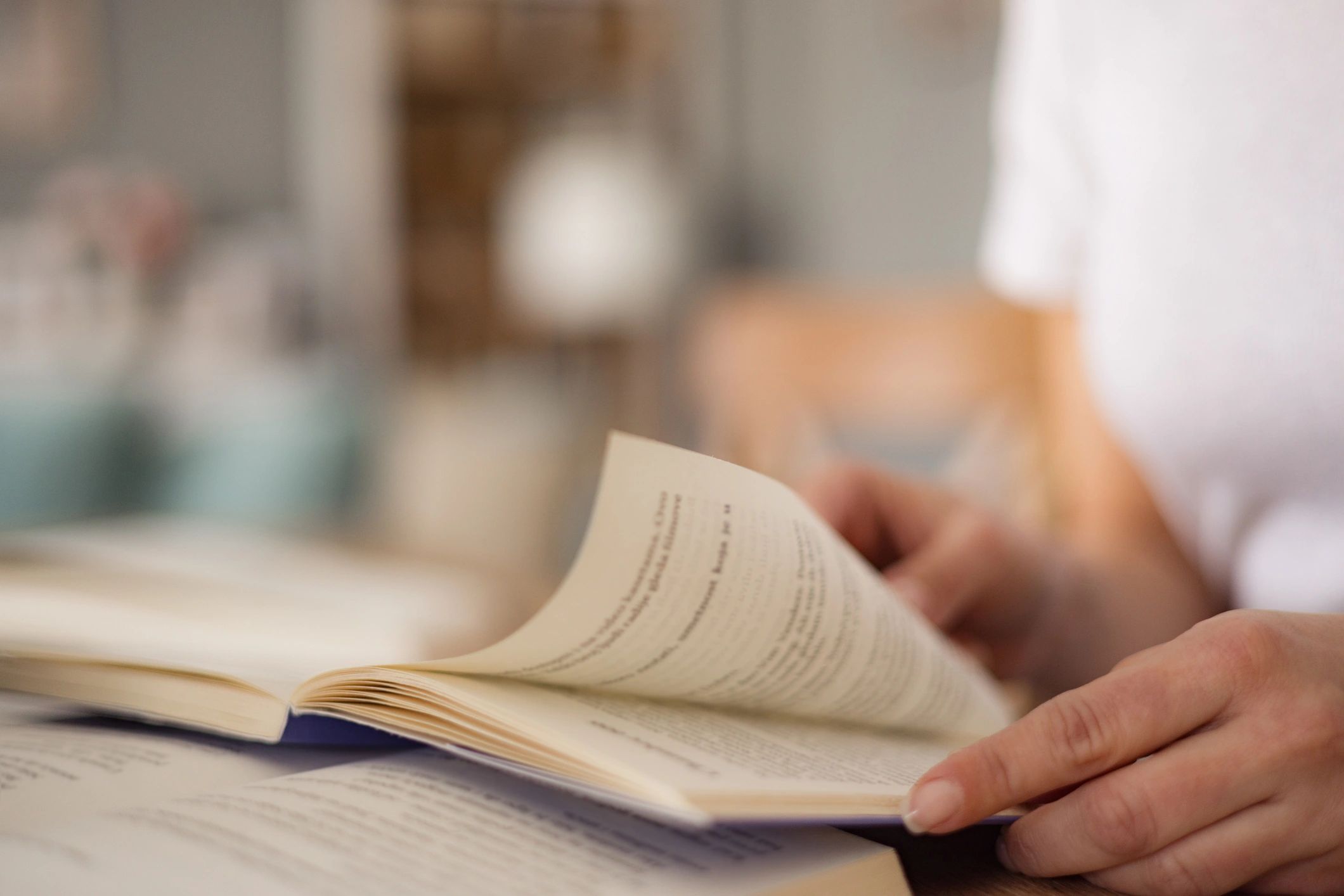 Close-up of reading an open book